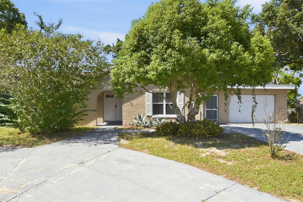 Photo of 1582 Darlington Avenue, Deltona, FL 32725 (MLS # O6450648)