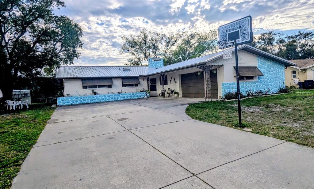 Photo of 7510 Pineapple Lane, Port Richey, FL 34668 (MLS # TB8483951)