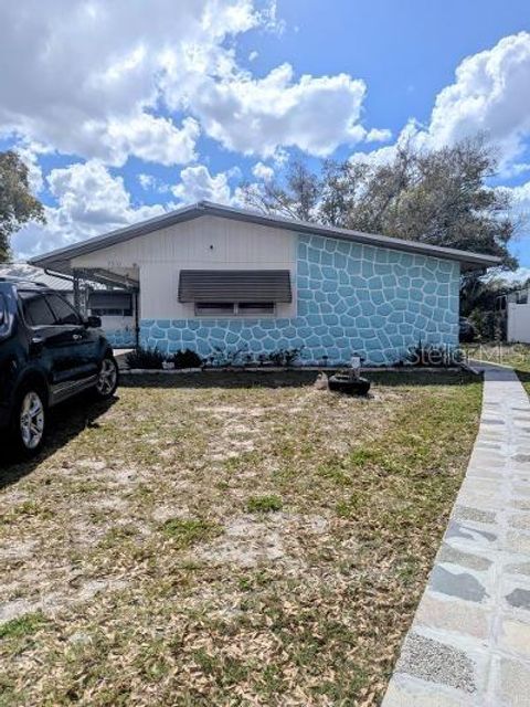 Photo of 7510 Pineapple Lane, Port Richey, FL 34668 (MLS # TB8483951)