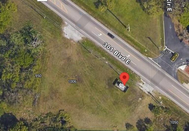 1.2967 Acres of prime commercial property. Excellent location just east of US301 with easy access. Property is zoned NC-M, neighborhood commercial medium. Two adjacent vacant commercial lots. Being sold all together. Measurements are approximate by public records. Buyer to verify measurements, zoning and land use regulations.