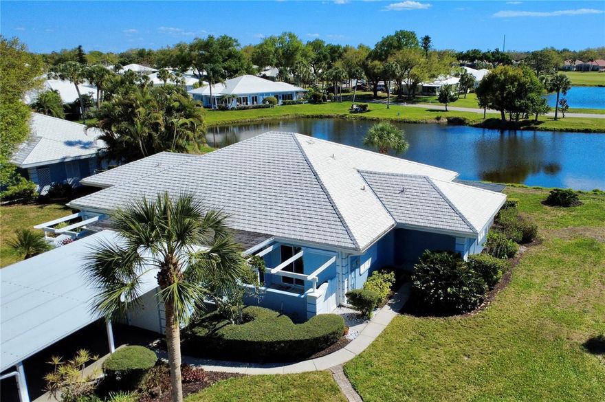 Wonderful Waterfront Views in Beautiful Augusta Villas in Plantation! Not one but two separate lake views PLUS the fantastic planation golf course just beyond makes this villa among the best views in all of Augusta Villas. This 3 bedroom, 2 bathroom home is currently setup with one of the bedrooms extending the living area, giving you additional lighting and living space. The primary bedroom is unique featuring an additional den/office, or flex space. This space serves as an added benefit by connecting the previously detached laundry room directly to the interior of the home for added convenience. The primary bedroom features an updated en-suite bath with dual vanities and sinks, a walk-in roman style shower, plus a large walk-in closet. Updated kitchen with granite counters and stainless-steel fridge, hood, and oven. Fantastic water views from your screened lanai area, and from the main living area. Unique front gated porch area with pergola gives you lots of additional outdoor living space. Conveniently located close to Wellen Park, Historic Downtown Venice, and Gulf Coast Beaches. The Augusta Villas community features two community pools, included lawn maintenance, and exterior home maintenance including roof replacement and cleaning. Optional golf, social, or fitness membership to the Plantation Golf and Country Club just down the road. Come and see this wonderful home today!