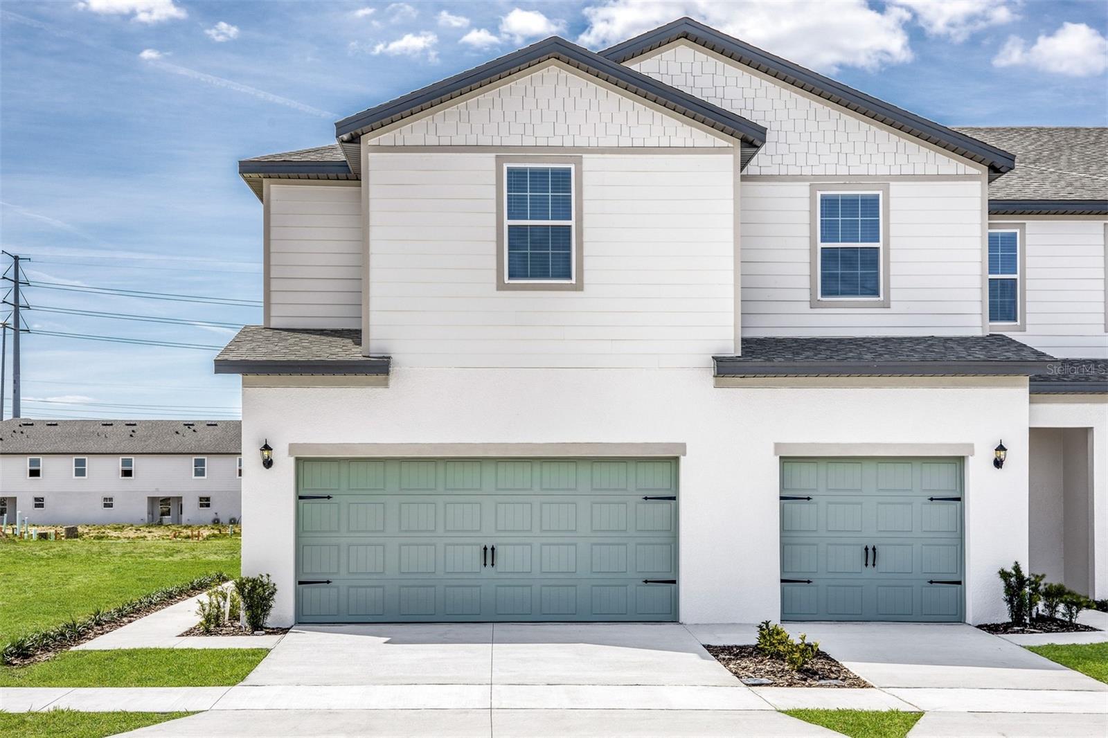 The Destin at Sol Vista offers a spacious two-story layout designed with families in mind. Featuring three bedrooms, each with a walk-in closet, and two-and-a-half baths, this floor plan provides exceptional storage and convenience. An upstairs bonus room offers flexible space that can serve as a home office, playroom, or gym. The open-concept kitchen is equipped with granite countertops, stainless steel Whirlpool® appliances, and a large island, all included at no extra cost. A covered back patio extends your living space outdoors. Located in Sol Vista, just minutes from Winter Haven, residents will enjoy community amenities and nearby attractions in this prime Dundee location.