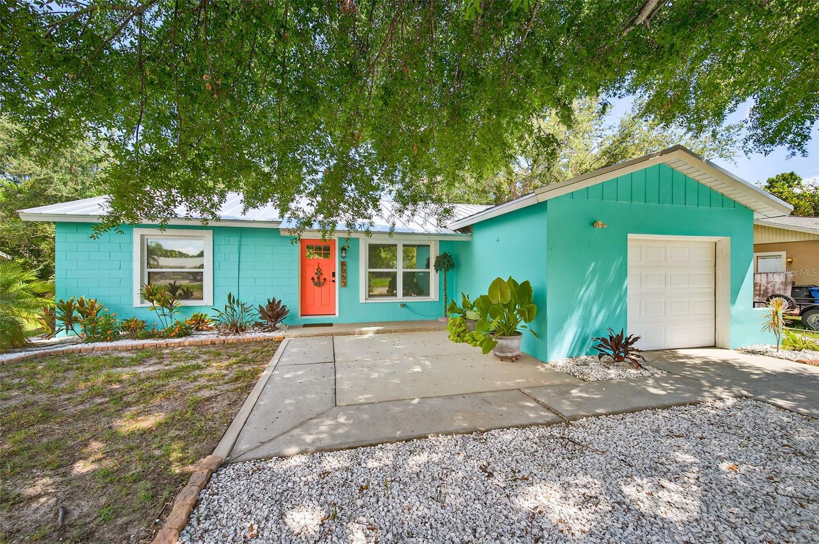 Welcome to this beautifully renovated 3-bedroom, 2-bathroom single-family home in the heart of Apollo Beach. With no HOA, no CDD fees, and no deed restrictions, this property offers flexibility and convenience, paired with a long list of recent upgrades that provide modern comfort and peace of mind. Major improvements include a new metal roof (2024), HVAC system (2024), tankless hot water heater (2024), blow-in insulation (2025), and luxury vinyl plank flooring (2023). The kitchen has been transformed with updated cabinetry, hardware, butcher block countertops, a farmhouse sink with new faucet, and a modern design perfect for cooking and entertaining. The main bathroom and closet were fully customized in 2024, and the guest bathroom features a new vanity and fixtures. Throughout the home, popcorn ceilings have been covered with marine grade shiplap (2024–2025), adding charm and durability. Additional updates include a new sliding glass door, all new exterior and interior doors with upgraded hardware (2024), an updated laundry room (2024), fresh interior and exterior paint (2024), and custom touches like built-in bookshelves (2024) and a dedicated office space (2025). The property also features a spacious fenced backyard with updated landscaping (2024–2025), ideal for relaxing or entertaining. For added safety, all windows are equipped with hurricane protection film. Conveniently located near golf courses, marinas, boat ramps, shopping, dining, schools, parks, healthcare facilities, and the Manatee Viewing Center, this home is just a short drive to award-winning Gulf beaches. Its central location between Tampa, Orlando, and the Gulf Coast beaches—including Anna Maria Island, Siesta Key, Lido Key, and Bradenton Beach—offers endless options for recreation, travel, and entertainment. Easy access to Tampa International Airport, MacDill Air Force Base, and I-75 ensures smooth commuting throughout the region. With its extensive upgrades and prime location, this home is truly move-in ready.