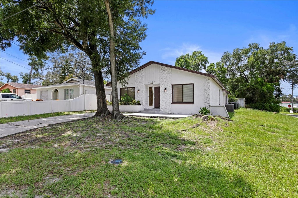 Photo of 8520 N Branch Avenue, Tampa, FL 33604 (MLS # TB8544521)