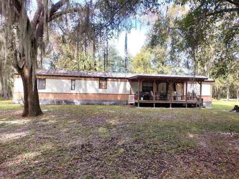 Photo of 414 Bimini Lane, Bunnell, FL 32110 (MLS # FC314119)