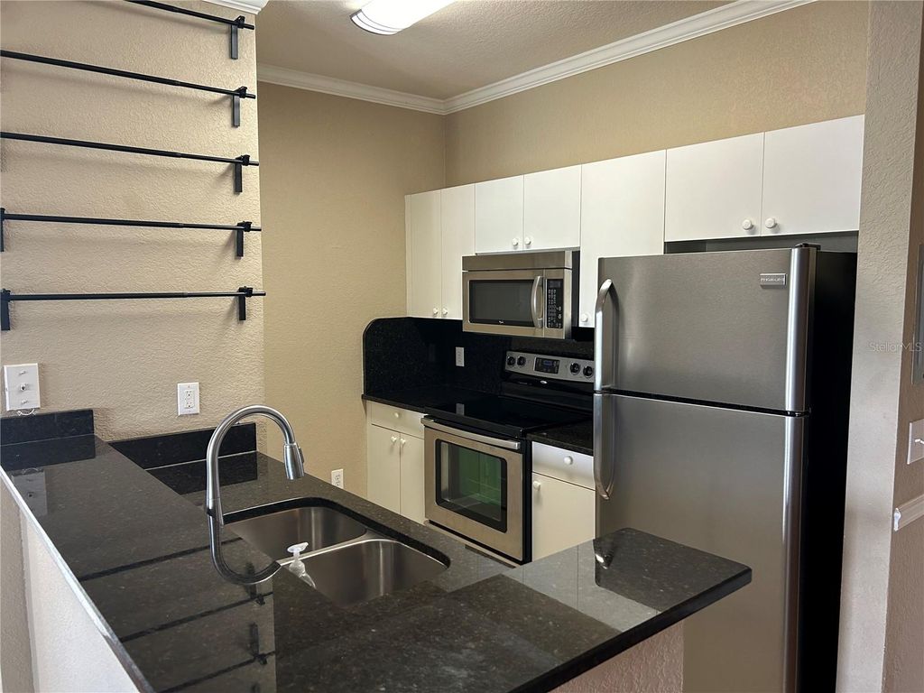 Photo of 3599 Conroy Road #934, Orlando, FL 32839 (MLS # O6406470)