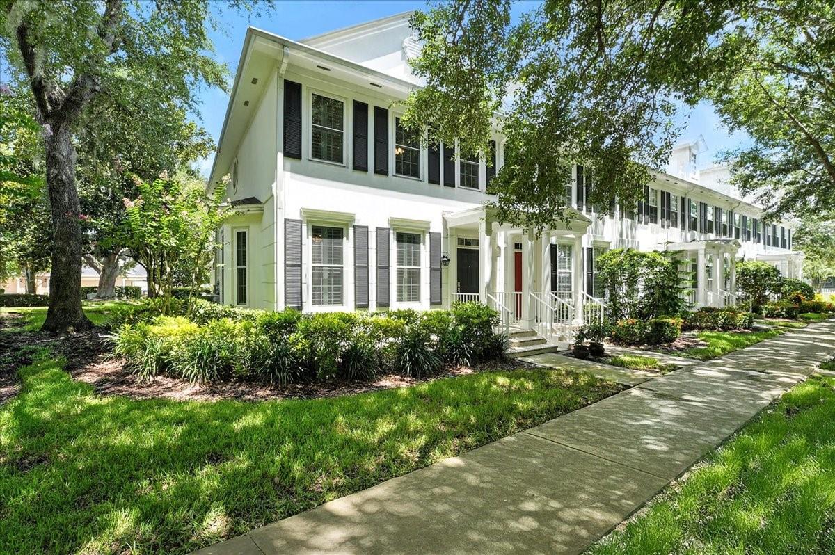 You’ve never seen a townhome like this in Northlake Park, Lake Nona! This end-unit stunner is fully renovated—top to bottom—including new dual-pane windows for energy efficiency and year-round comfort. The bathrooms? Gorgeous. The kitchen? A chef’s dream with luxury finishes, quartz counters, farm sink, and premium appliances. Rich hardwood flooring runs throughout, and the entire space is truly move-in ready. Step outside and you’re looking at green space instead of traffic, just steps away from Panera Bread, Nona Blue, and the Northlake Park YMCA Family Center & Pool (with a 4-person membership included in your HOA). This location gives you all the best of Lake Nona without the congestion of the south side and includes A-rated schools: Northlake Park Elementary, Lake Nona Middle, and Lake Nona High. With over $150,000 in upgrades—including new roof (2020), central vac, plantation shutters, and even Italian tile in the master bath—this home offers a level of quality rarely seen in townhomes here. Updated, turnkey, end-unit townhomes like this are rare. Don’t wait—this one’s special.