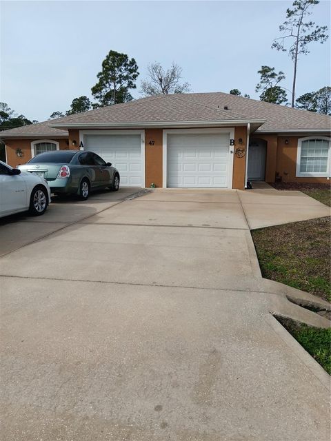 47 WELLWOOD LANE PALM COAST FL 32164