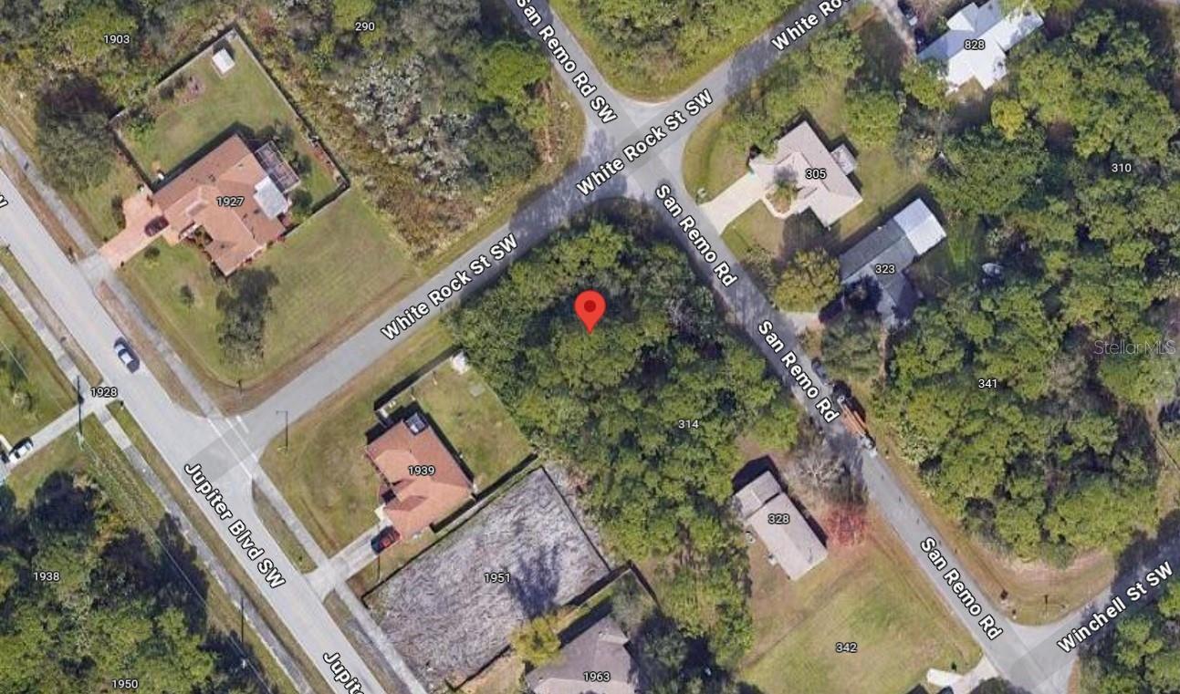 LOCATION, LOCATION, LOCATION! This 0.26-acre vacant lot in Palm Bay’s desirable Port Malabar community is the perfect blank canvas for your dream home. With no HOA, you have complete freedom to design your house and landscaping exactly the way you envision it. The property is currently untouched and sits in a well-established residential neighborhood, offering both privacy and a welcoming sense of community.
Palm Bay is a city full of recreational options—from relaxing on nearby beaches just 30 minutes away, to exploring parks, nature preserves, and golf courses. World-class attractions like Walt Disney World are less than two hours away. Everyday needs are close at hand with Publix about 10 minutes from the property, plus plenty of dining, shopping, schools, I-95 access, and Melbourne Orlando International Airport (MLB) nearby.
Opportunities like this don’t come around often—build your Florida dream home in a growing area where new homes are popping up all around. Don’t wait, secure this property today!