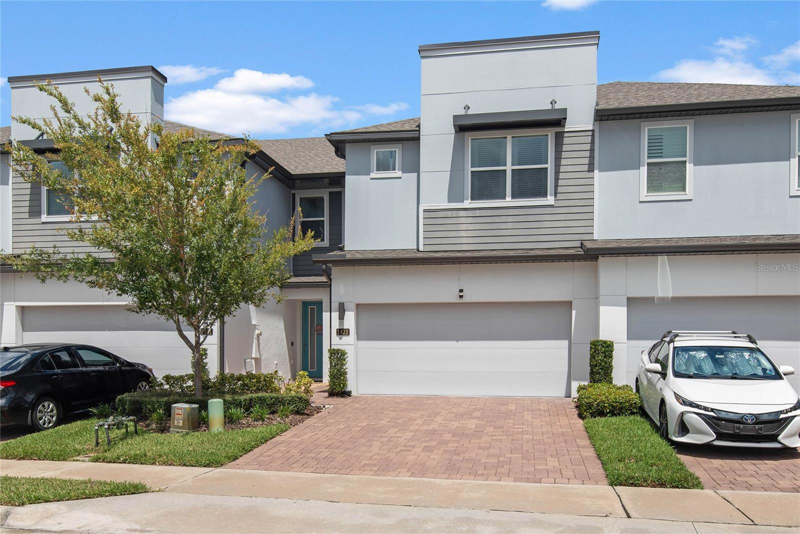 Now's your chance! Experience living in the sought-after gated community of Hawks Crest. This elegant 3-bedroom, 2.5-bathroom home offers 1,964 sq ft of thoughtfully designed living space with a 2-car garage. As you enter, natural light floods the spacious living room, highlighting the modern finishes and open layout. The gourmet kitchen is a chef’s dream—equipped with top-of-the-line stainless steel appliances, stone countertops, custom backsplash, and a generously sized center island perfect for casual dining or entertaining. A separate dining area and stylish half bath complete the main floor. Step outside to your covered patio overlooking a beautifully maintained yard and wooded area, ideal for relaxing or weekend barbecues. Upstairs, you’ll find the luxurious primary suite featuring tray ceilings, a spacious walk-in closet, and a well-appointed en suite bathroom for your comfort and privacy. Also upstairs you’ll find two large guest bedrooms, a full bath, a convenient laundry room, and a linen closet. Residents of Hawks Crest enjoy resort-style amenities, including a community pool, clubhouse with outdoor grills, and a playground—all in a prime location. This home is move-in ready. Don’t miss the opportunity to own in one of the area’s most desirable communities. Schedule your private showing today!
