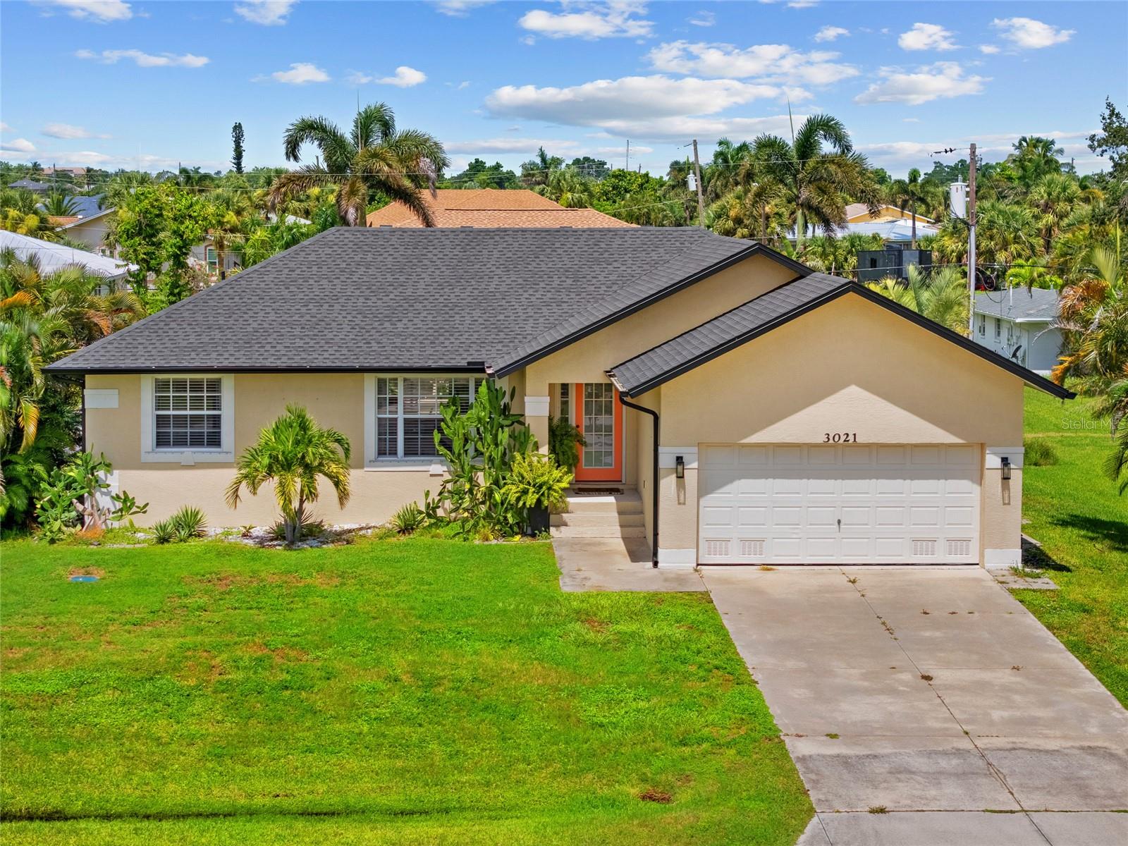 MINUTES FROM DOWNTOWN PUNTA GORDA! SPACIOUS 3 BEDROOM, 2BATH, 2 CAR GARAGE W/ POOL! NEWER ROOF! Open, split floorplan with ample natural light, high ceilings, neutral decor and tile throughout. The kitchen offers wood cabinetry, laminate countertops, closet pantry, pass through window and breakfast bar great for entertaining. Generous primary suite features several windows creating a light and bright ambiance, accent wall, walk-in closet and en-suite bath with access to the lanai. The split floor plan provides guests with plenty of privacy, with two additional bedrooms sharing a separate full bath. Outside entertaining area features covered lanai, screened pool and pavers with newer pool pump. Additional features include inside laundry room, newer dryer, hurricane shutters, shed for added storage space, and community boat launch nearby perfect for paddle boarding, kayaking and boating. Close to St. Andrews South Golf Club, the Yacht Club, Fishermen's Village, and the historic downtown area of Punta Gorda. Enjoy access to arts, community events, entertainment, world-class fishing, boating, fine dining, and beautiful parks, as well as easy access to the SWFL gulf beaches. Don't miss this opportunity! Schedule your private showing today!