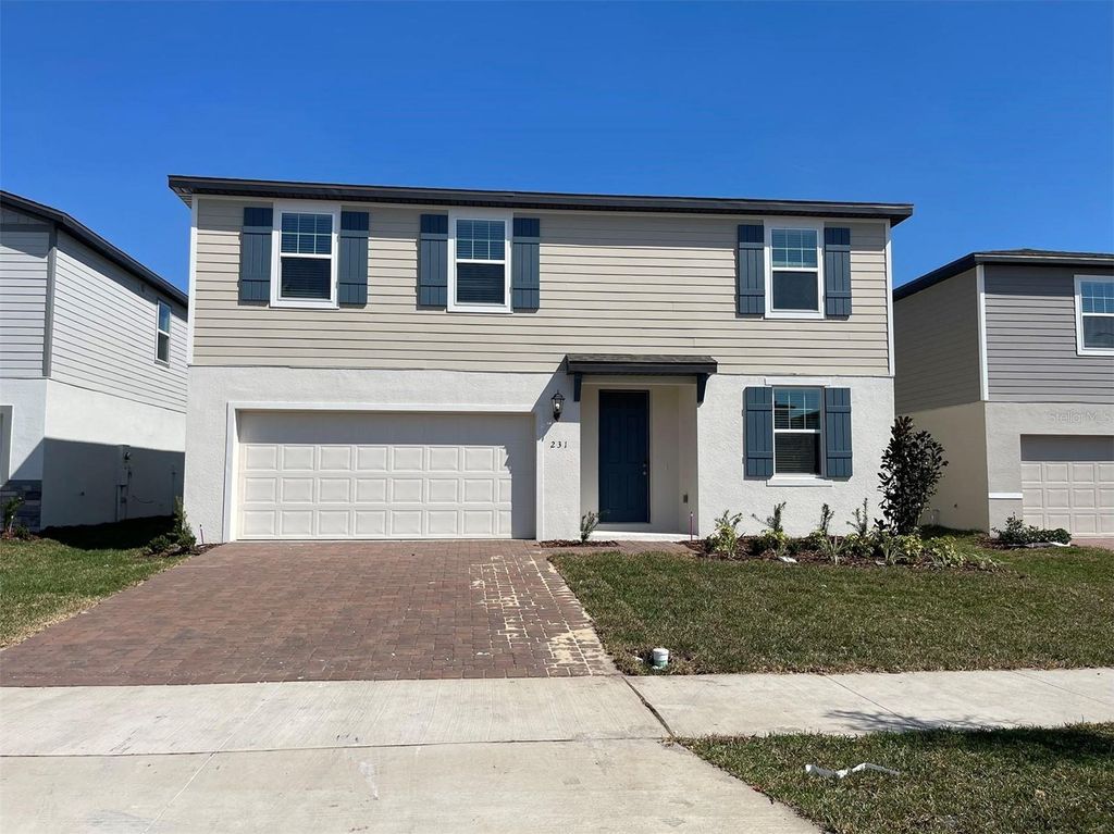 Photo of 231 Whistling Duck Trail, Saint Cloud, FL 34771 (MLS # O6394456)