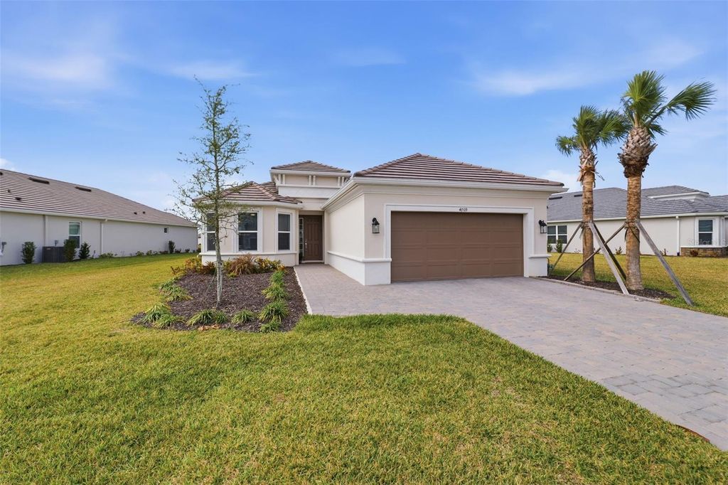 Photo of 4709 Isonzo Way, Wesley Chapel, FL 33543 (MLS # W7883441)