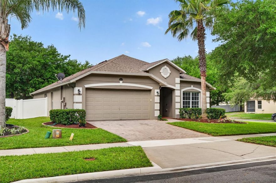 Tucked inside the desirable Enclave at Moss Park, just minutes from all the Lake Nona favorites, this beautifully maintained 4-bedroom, 3-bathroom home offers the perfect blend of space, function, and location.

Situated on a large corner lot directly across from a charming island park, this home welcomes you through double front doors into a bright foyer. To the right, a flexible bedroom, ideal for a home office, guest room, or playroom, connects via a Jack & Jill bathroom to an additional bedroom, creating a smart and versatile layout. Just beyond, find another bedroom and a full bath, along with a conveniently located laundry closet.

The heart of the home opens into a spacious, adaptable living area, with room for formal dining, a play space, or entertaining. The kitchen has been thoughtfully updated with a large island overlooking the main living space and a dinette overlooking the backyard, solid-surface countertops, and recent upgrades, including a new refrigerator (2024), oven and microwave (2025), dishwasher (2022).

Privately tucked off the living area, the primary suite offers peaceful backyard views, two closets, and a generously sized ensuite featuring a beautifully remodeled shower.

Sliding doors with plantation shutters lead to a covered lanai—perfect for al fresco dining or slow mornings with coffee and a good book. The fully fenced backyard provides ample space to create your own outdoor oasis, with room to relax, garden, or entertain.

Major system updates include an HVAC (2017), roof (2020), and water heater (2025), plus a transferable termite warranty for added peace of mind. The garage is equipped with a Tesla charger, making this home EV-ready.

Residents of Enclave at Moss Park enjoy tree-lined walking paths, shaded parks, and a community pool, all in a serene setting that feels tucked away yet remains incredibly convenient. With easy access to the 417, 528, and Orlando International Airport, plus all the shopping and dining of Lake Nona just minutes away, this location truly offers the best of both worlds.

Welcome home to comfort, convenience, and a lifestyle you’ll love.
