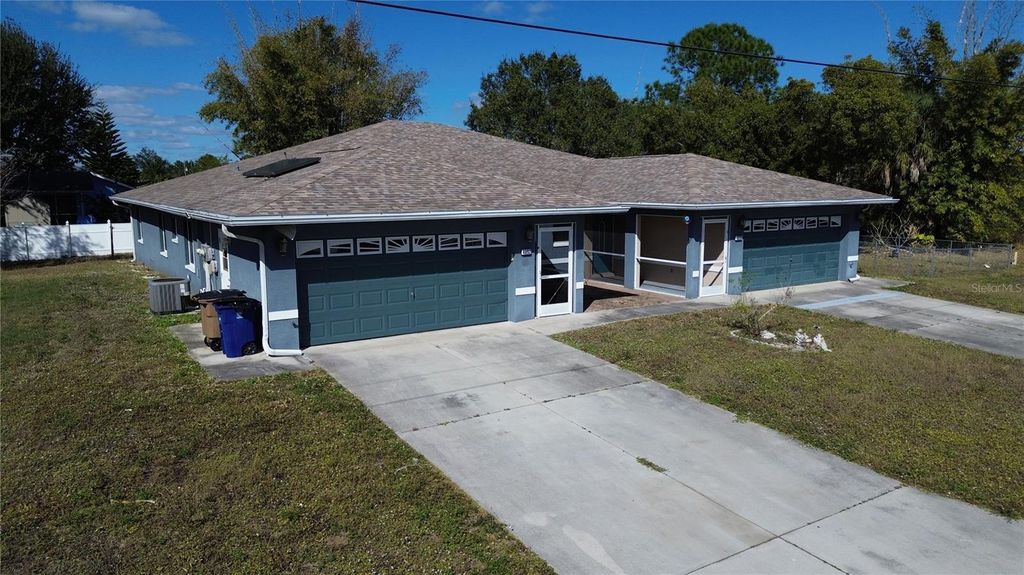 Photo of 4892 Jordan Avenue S, Lehigh Acres, FL 33973 (MLS # O6368003)
