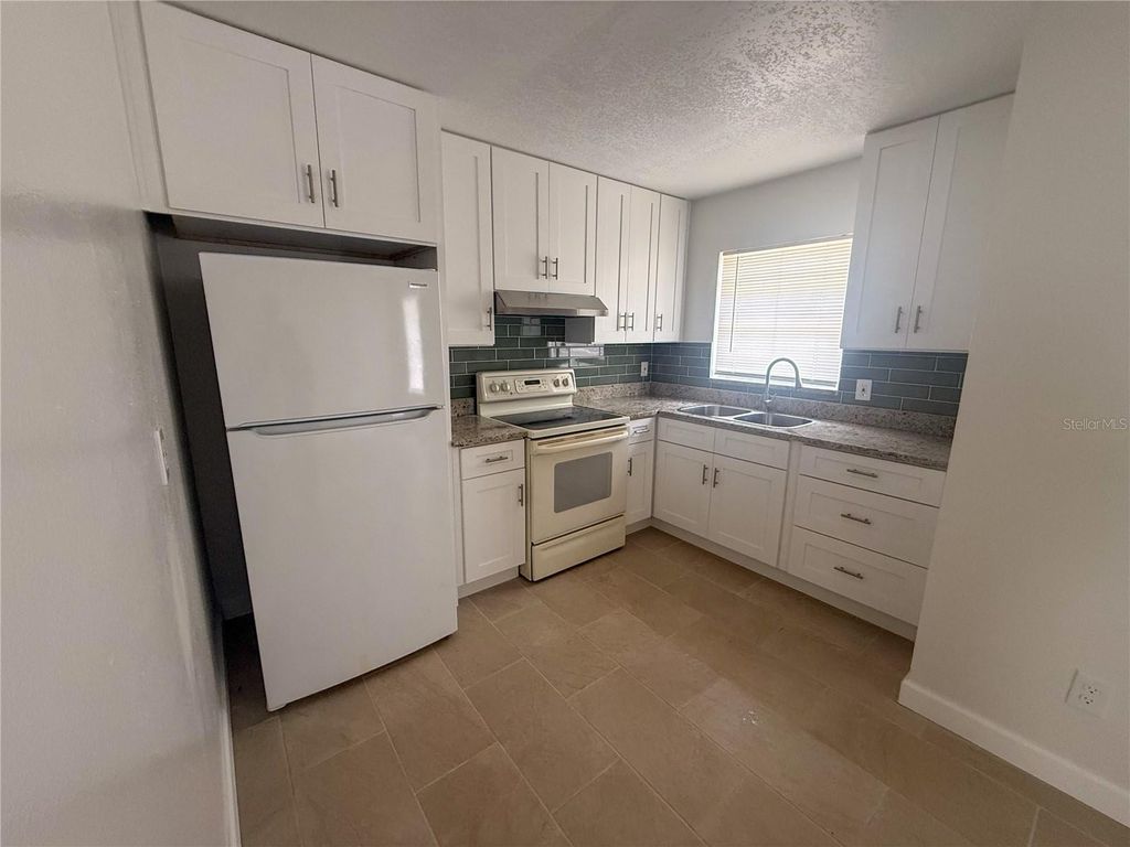 Photo of 7517 Lakeshore Drive #A, Tampa, FL 33604 (MLS # TB8496630)