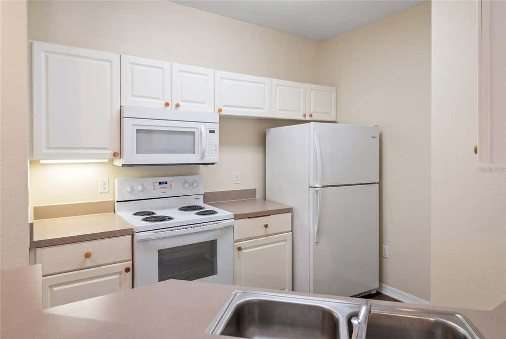 Photo of 5500 Metrowest Boulevard #211, Orlando, FL 32811 (MLS # O6436262)