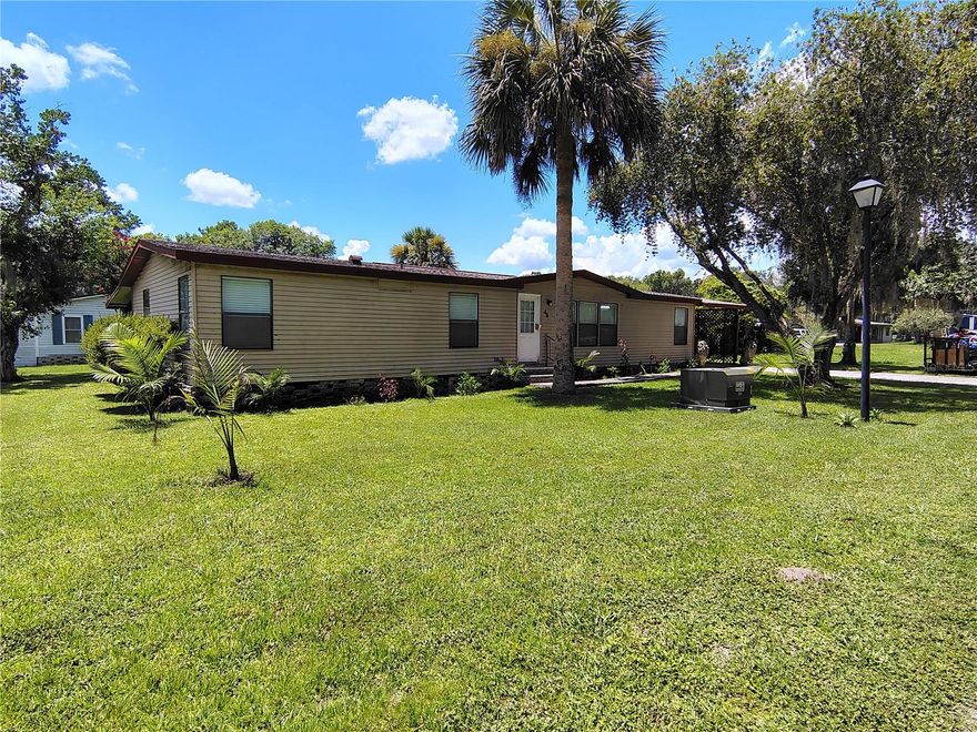 Welcome to your dream home! Escape the ordinary and live just minutes from the natural beauty of Lake Panasoffkee Outlet River in this fully renovated 3-bedroom, 2-bathroom home sitting on a double lot. This home offers water access through a private boat ramp- a true hidden gem for outdoor lovers. Step inside to see how modern comfort blends with stylish finishes. While having an open concept living and dining that is filled with natural light, new flooring throughout, and custom touches, it also boasts a remodeled kitchen with new cabinetry and quartz countertops! Get ready to watch your favorite movie in your new home with the spacious media room, leading to the oversized screened in porch- an ideal space for relaxing, hosting gatherings with friends or family, or simply enjoying Florida’s year-round sunshine in peace and privacy. Enjoy the small-town charm while still being only miles down the road from The Villages that hosts free nightly entertainment, golf courses, shopping, dining, and much more! You're also close to Florida’s west coast, offering waterfront dining, kayaking, fishing, beaches, and natural springs for the perfect weekend adventures. Equal Housing Opportunity. MOTIVATED SELLERS!!