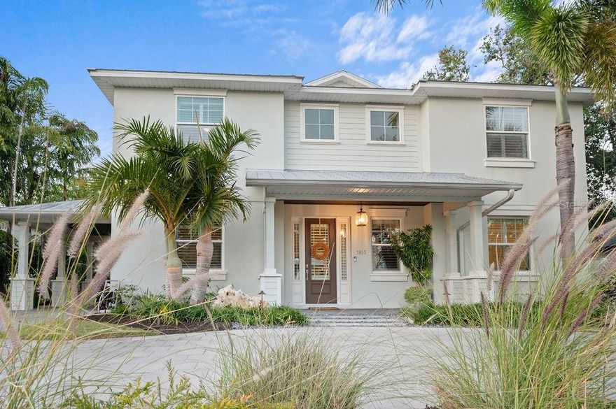 Experience unparalleled luxury and comfort in this stunning home, located in the highly sought-after West of the Trail neighborhood. Built in 2013, this residence effortlessly blends sophisticated design with functional living. Featuring a spacious open floor plan, a first-floor primary suite, a chef-inspired kitchen, and a private backyard oasis with a sparkling pool and outdoor kitchen, this home offers the ultimate in modern living.
Notable upgrades throughout include a new refrigerator, washer and dryer, well pump, pool pump, pool salt system, AC motor, and exterior fans. Impact-resistant windows and doors ensure safety and peace of mind. The custom kitchen, equipped with stainless steel appliances and white Shaker cabinetry, flows seamlessly into the light-filled living areas, with soaring ceilings that amplify the natural light.  For those who work from home, the thoughtfully positioned office on the first floor offers both privacy and convenience.
The desirable split floor plan places the primary bedroom suite on the first floor, featuring private access to the outdoors, dual walk-in closets, and a luxurious en-suite bath with dual vanities, a walk-in glass shower, and a freestanding soaking tub. Upstairs, three generously sized guest bedrooms and two well-appointed bathrooms offer ample space and privacy for family and friends.
Outside, the professionally designed backyard oasis is perfect for both relaxation and entertainment. Enjoy a heated pool, cabana, firepit, trampoline, and a spacious play area, all surrounded by lush, private landscaping. The backyard oasis is complemented by a new cage enclosing the outdoor kitchen and pool, pool equipment, and a Mosquito Nix system using natural chrysanthemum extract to keep you comfortable year-round. The outdoor kitchen with built-in TV, speakers, and a convenient half bath is ideal for yearlong outdoor entertaining.
Additional features include an oversized garage with a new mini-split air conditioner, porte-cochère, and a pavered circle drive with plenty of parking. Situated just one block from the top-rated Southside Elementary School, and within close proximity to Sarasota Memorial Hospital, Southside Village, and the vibrant dining, shopping, and cultural offerings nearby, this home is ideally located. Minutes from downtown Sarasota and Siesta Key’s world-class beaches, 1815 Grove Street offers the perfect balance of convenience and tranquility.
This exceptional home is ready to exceed your expectations—schedule your private showing today and discover your dream home in one of Sarasota's most desirable neighborhoods