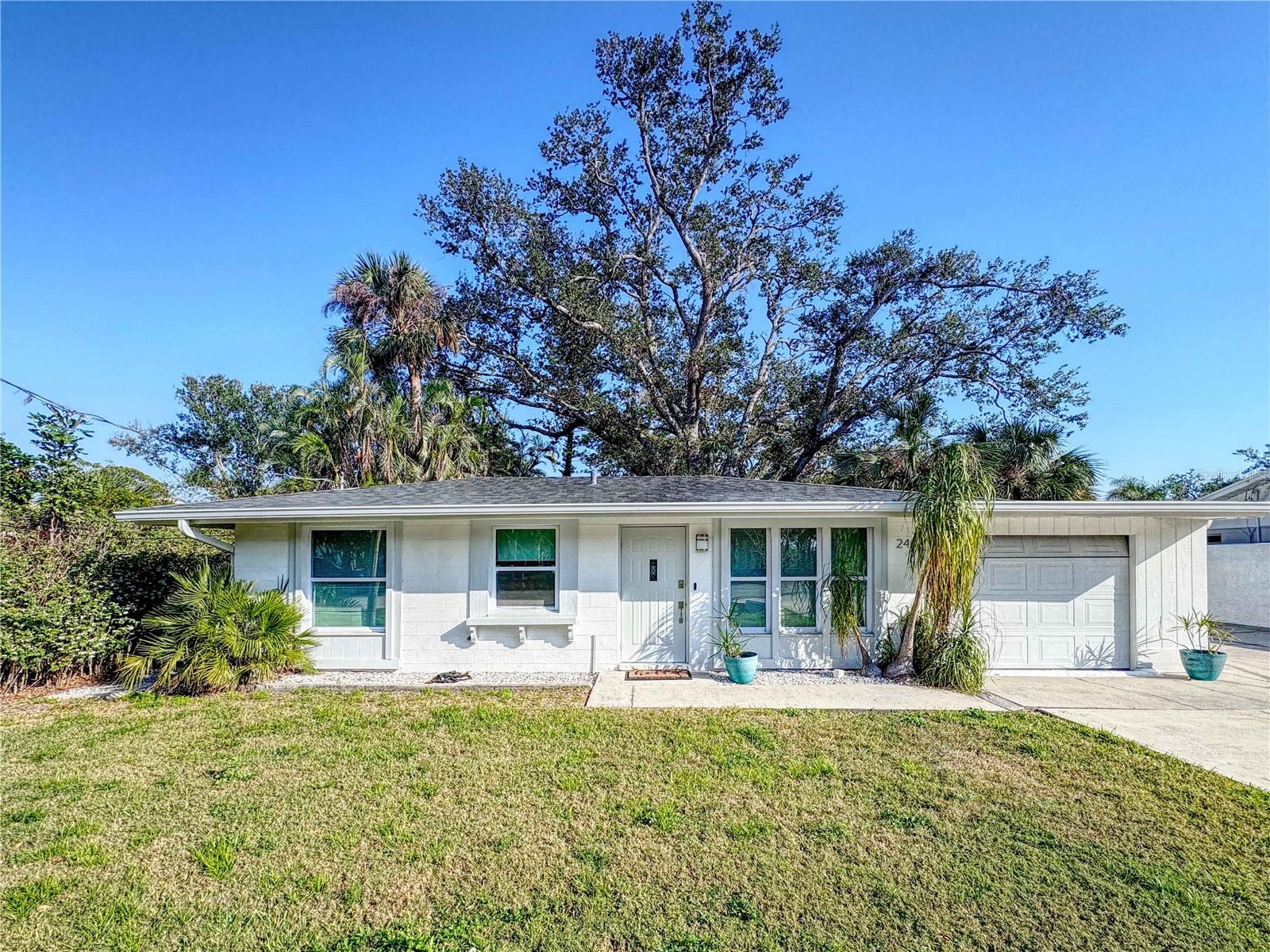 Charming Coastal Retreat in the Heart of Nokomis
Welcome to 240 Pocono Trail E, Nokomis, FL 34275, a beautifully maintained home offering the perfect blend of coastal charm and modern comfort. Nestled in a prime location just minutes from Nokomis Beach, the Intracoastal Waterway, and vibrant downtown Venice, this home is an ideal retreat for those seeking Florida’s relaxed lifestyle.
Step inside to find a spacious and inviting interior, featuring vaulted ceilings, abundant natural light, and stylish finishes throughout. The thoughtfully designed layout includes a well-appointed kitchen with modern appliances and ample storage, making it perfect for entertaining. The open-concept living and dining areas seamlessly flow to the outdoor space, where a private patio provides a serene setting to enjoy Florida’s sunshine.
This home is situated on a generous lot with lush landscaping, offering both privacy and tranquility. With easy access to top-rated schools, shopping, dining, and I-75, this property is a fantastic opportunity for year-round living or a seasonal getaway.
