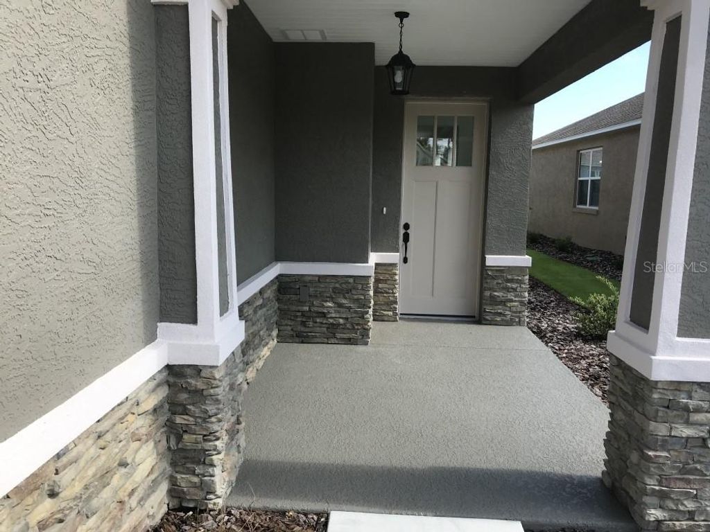 Photo of 9890 SW 99th Loop, Ocala, FL 34481 (MLS # OM721518)