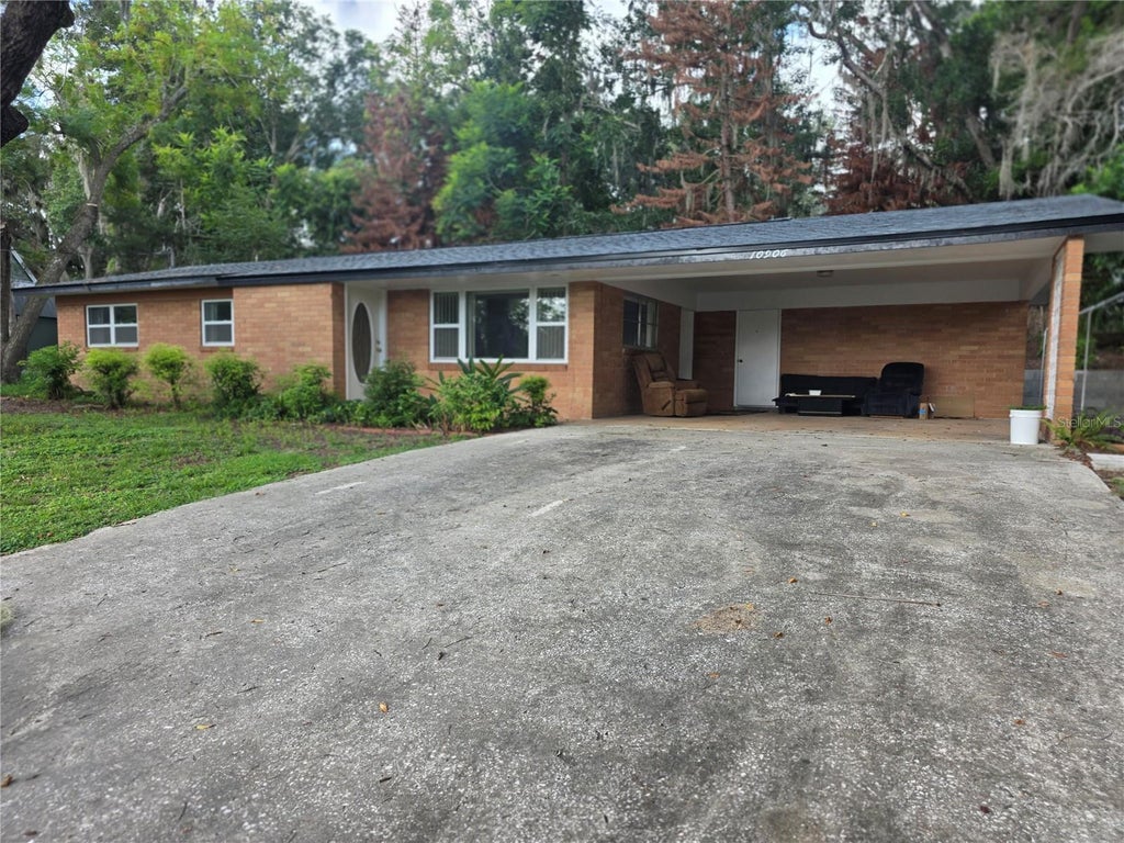 Photo of 10906 Crescent Lane, Clermont, FL 34711 (MLS # O6445915)