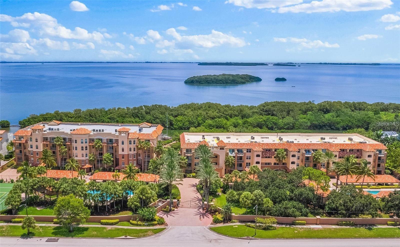 Rare opportunity, over 2500 sq.ft. of high-end renovations in this luxury 3 bedroom 3 bath condominium with an oversized enclosed private garage and additional covered carport and an elevator to your private foyer entry. Open concept with high-end finishes, spacious master suite with a large walk-in California Closet and a Vogue en suite bath with multiple shower/rain heads and a soaking tub, water closet and double sink vanity. Multiple balconies with water views, tropical setting views, the nature's boardwalk, the fishing pier and pool views. Inside laundry room, formal dining, 3rd bedroom with study or exercise room and another bedroom with an en suite bath. This is truly a very special offering on a luxury condominium in a gated community situated in a tropical setting on the bay with 2 swimming pools, tennis/pickleball courts, fitness center, electric car charging stations, fishing pier, kayak storage and leasable boat slips, in proximity to Famous Ft. Desoto with over 1,000 acres of biking, hiking trails and world famous beaches, yet close to shopping entertainment and minutes from major interstates and international airports.