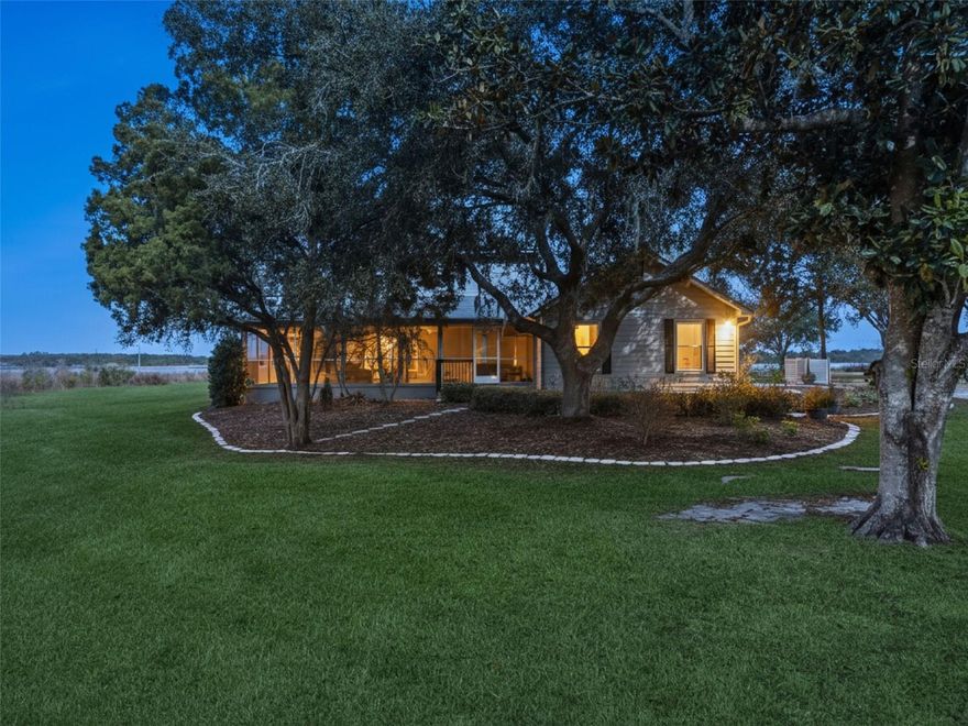 Country retreat on serene Lake Annie, nestled between Lake Wales and Winter Haven.  Meander down a private road to a winding driveway on the west side of Lake Annie, where sunrises are always photo-worthy. When evening comes, view a sky full of stars, planets, or even regular rocket launches. This property breathes Florida of old, yet is situated just 2 miles from Highway 27 daily conveniences such as grocery stores, home improvement, and dining options.  Current owners have enjoyed this lakefront escape for the past 22 years.

What’s special:  
Oversized picture windows capitalize on the landscape and lake views. 
Screened lanai and Pebble Tec-coated pool blends naturally into the landscape 
Cooling travertine flooring downstairs and newly installed warm tile upstairs.  
Well water keeps utility bills at bay.  
Fenced pasture across the drive comprises a portion of the 8.5 acres.