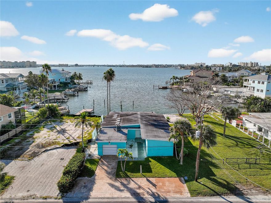 AS-IS FLOOD-DAMAGED PROPERTY Double Lot | 120 Feet of Waterfront | Stunning Intracoastal Views
An incredible opportunity for investors or buyers seeking a prime waterfront location! This 4-bedroom, 3-bath home, newly updated prior to Hurricane Helene, sits on a double lot spanning 120 feet of breathtaking intracoastal frontage.  Spacious Double Lot with ample room for redevelopment or restoration.  120 Feet of Waterfront, offering panoramic views and direct access to the water.  This property is being sold as-is, presenting a unique chance to create your dream home or take advantage of its redevelopment potential. 

Schedule a viewing today to explore the opportunities this rare waterfront property has to offer!