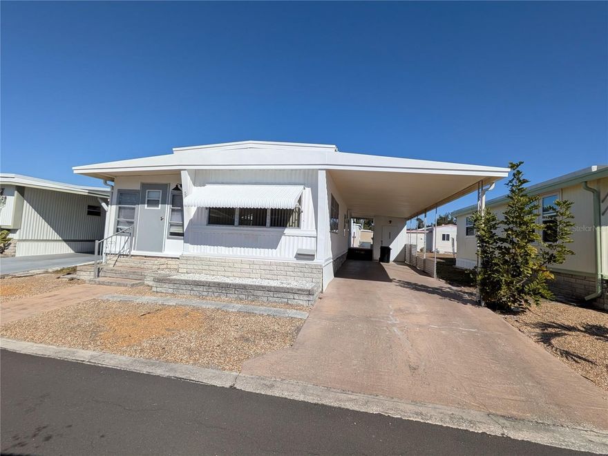 Upgraded and ready for move in! New flooring throughout, new interior and exterior paint, new water heater and much more. 
Prime location next to pool, guest parking, clubhouse and laundry room. 

ESA & Service dogs only allowed. 55+ community. 

Carport for 2 cars