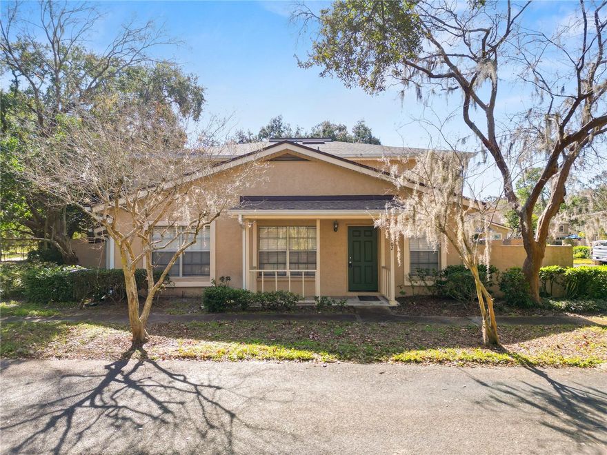 Set in the established Raintree Manor community, this end-unit, two-story condo is surrounded by mature landscaping and sits near a peaceful lake, giving the area a relaxed, lived-in feel. The home also features a newer roof, adding peace of mind for years to come.

The home is accessed through a side entrance with a covered front patio. Porcelain tile runs throughout, keeping the space clean and easy to care for. The main level flows comfortably between the living and dining areas, making it easy to settle in or spend time with friends and family.

At the front of the home, wide windows let in plenty of natural light. This space also includes a washer and dryer and two coat closets, adding everyday convenience without feeling cluttered. The dining area opens to the outdoors through sliding glass doors, bringing in fresh air and natural light.

Also located on the main level, the primary bedroom offers a quiet retreat with a walk-in closet and a private bathroom featuring a tiled walk-in shower, single sink, and medicine cabinet.

The galley kitchen is practical and well laid out, with plenty of counter space, generous cabinetry, a new refrigerator and a window that brightens the room while you cook.

Upstairs, the guest bedrooms are comfortably sized, each with double-wide closets, and one with a walk-in closet. The guest bathroom features a tiled walk-in shower with glass sliding doors, a single vanity, and a medicine cabinet.

Out back, the home features a patio with privacy walls, creating a more secluded outdoor space for seating or enjoying the Florida weather.

Raintree Manor residents have access to two community pools with covered seating, tennis courts, and well-maintained common areas. With nearby parks and local favorite restaurants close by, the location makes day-to-day life easy without feeling busy.

If you’re looking for a home that feels comfortable, practical, and well connected, this end-unit condo is worth seeing in person. Schedule a showing and take a look for yourself.