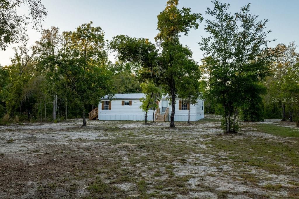 Photo of 9591 NE 87th Place, Bronson, FL 32621 (MLS # OM722849)