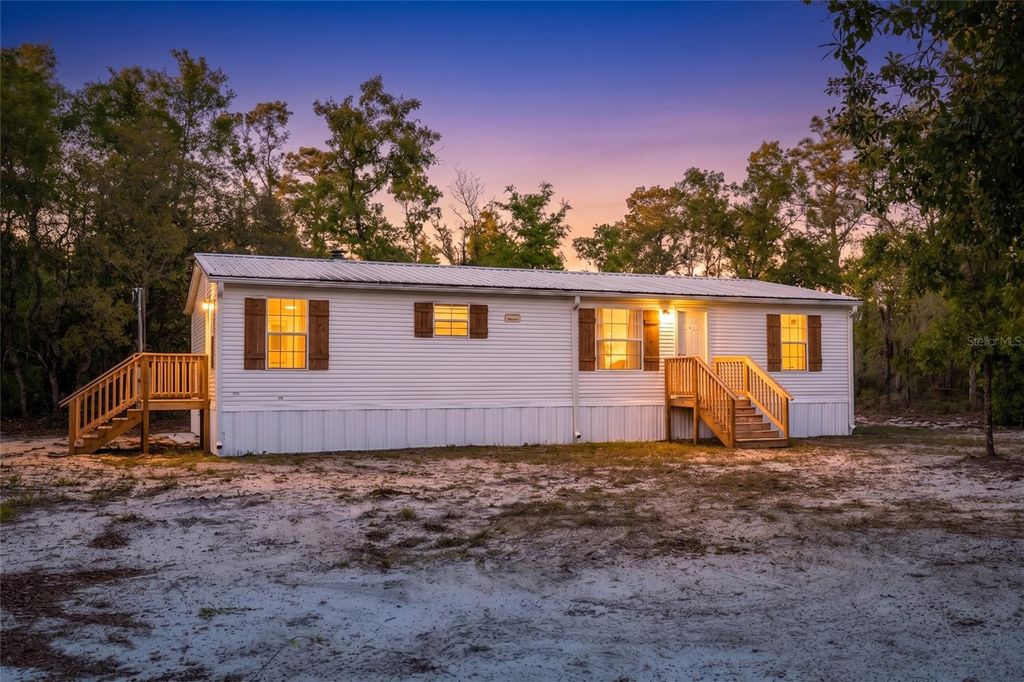 Photo of 9591 NE 87th Place, Bronson, FL 32621 (MLS # OM722849)