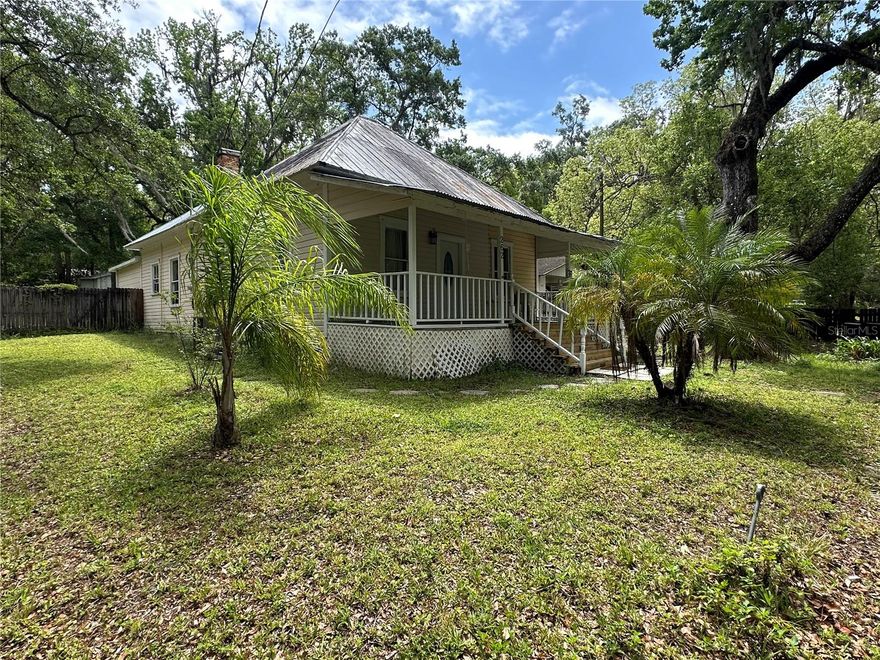 Welcome to historical downtown Brooksville, where this charming home sits on a large corner lot. The home has 3 bedrooms and 1.5 baths, and a large multi purpose room in rear of home. The 14x20 shed in the back of the home has a roll up door and is perfect for storage. Walk to the library, courthouse and shops/dining on Main St. Sit on your front porch and enjoy the beautiful Florida weather.