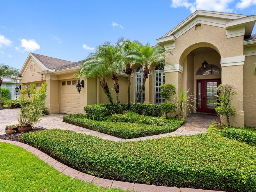 This beautifully updated waterfront pool home offers an exceptional lifestyle in the heart of Westchase's Woodbay neighborhood, combining comfort, privacy, and convenience in one of Florida’s most desirable suburbs. Inside, you'll find a smart four-bedroom, three-bath layout featuring an open-concept great room, elegant dining space, and a modern kitchen with high-end Viking appliances, abundant counter space, and serene views of the screened-in lanai, pool, and pond. The spacious primary suite includes direct lanai access and a private waterside retreat, while a secondary bedroom with its own bath and patio entrance is ideal for guests or multigenerational living. The outdoor area is designed for both relaxation and entertaining, with a heated pool, paver deck, and built-in Paradise Grill. Notable updates include a new AC, pool heater, and pool pump in 2022, a motorized retractable awning and custom backsplash also in 2022, and a roof replacement in 2017. Just steps from Glencliff Park and the Westchase Golf Club, and zoned for top-rated schools, this home offers unmatched access to community amenities including two resort-style pools, tennis and basketball courts, trails, parks, golf, and a lively town center with coffee shops, dining, and boutiques. With quick access to the Veterans Expressway, Westshore District, International Plaza, and Tampa International Airport, this is the perfect blend of lifestyle and location.