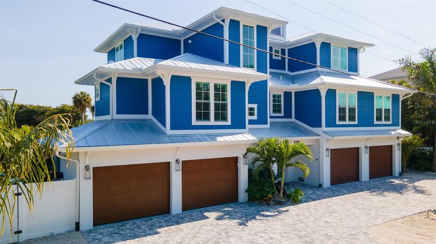 SPECTACULAR, NEW CUSTOM 4 BED, 5.5 BATH HOME IS PERFECTLY LOCATED IN BEACH BLOCK AND WALKING DISTANCE TO SHOPS AND RESTAURANTS.  THIS PROPERTY HAS IT ALL INCLUDING A RESORT STYLE POOL COMPLETE WITH SPA, ELEVATED SUN SHELF AND LAZY RIVER FEATURE.  THE OVERSIZED YARD HAS PLENTY OF SPACE FOR ENTERTAINING.  INTERIOR FINISHES INCLUDE CUSTOM, DECORATIVE TILE, MILL WORK, WOOD LOOK TILE FLOORING THROUGHOUT.  A LARGE OPEN FLOOR PLAN OFFERS PLENTY OF SPACE FOR LARGE GROUPS ON THE FIRST LEVEL AND A BONUS AREA ON THE SECOND LEVEL AS WELL.  OUTDOOR BALCONIES OFFER THE PERFECT SPACE FOR RELAXING AND THE ROOFTOP DECK PROVIDES VIEWS OF BOTH THE GULF AND BAY.  THIS IS THE PERFECT PROPERTY FOR FULL OR PART TIME BEACH LIVING.