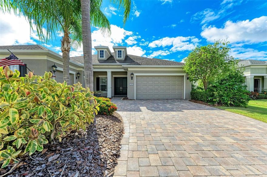 Enjoy Lake view from your oversized paved lanai. Just under 600 sqf of outdoor living features an outdoor kitchen, living and dinning area overlooking a heated salt water pool and spa. Just under 2800 sqf, this custom Lee Wetherington Baypointe model features an open floor plan, OFFICE/STUDY, BONUS ROOM and a split 3 bedroom 3 bathroom. special features include a split 3 car garage, marble backsplash, wooden cabinets, stone wall, tray ceilings decorative millwork and trim, and tons of storage. The office or bonus room give the flexibility of making this a 4 bedroom home. Located on a gem of a lot providing lots of privacy. The HOA covers: Gated community, community manager, common grounds, 2 dog parks, playground, splashed, Pavillon, tennis/pickleball courts and a sports field. Its centrally located and very near to A schools (Gullett, Dr Mona Jain and LWR HS, Lecom and Manatee Technical college) Close to UTC shopping and dinning,Sarasota airport and highly rated beaches in the country.