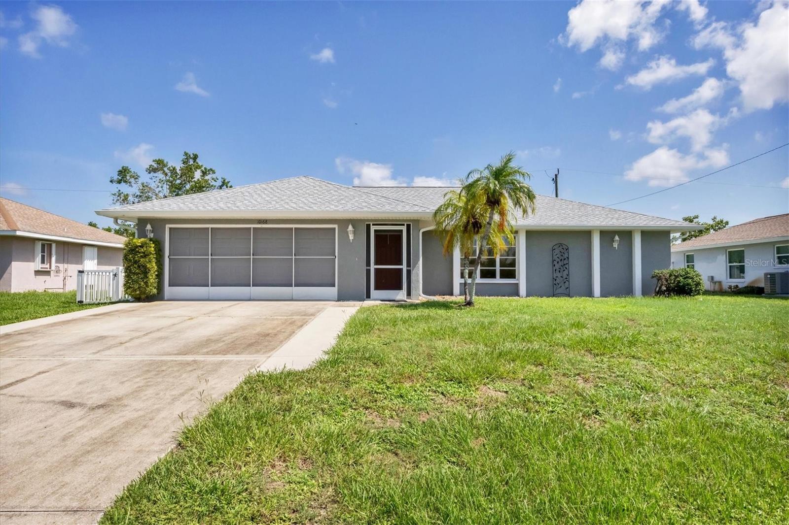 Less than 7 miles from the Beach! Welcome to your Florida retreat, located in a desirable X Flood Zone, no flood insurance required! This beautifully maintained home offers a generous layout and a long list of updates, making it move-in ready and perfect for full-time living, seasonal stays, or rental income. The HOME FEATURES: 2 bedrooms and 2 full bathrooms, living room + family room + dining room + dinette, an expansive interior laundry room with utility sink & extra shelving, 10' x 21' Florida Room (not included in A/C square footage), 2-car garage + 6' x 8' backyard shed, fully fenced backyard with an extended concrete patio and plenty of closet space throughout. SELLER UPDATES: Luxury vinyl plank flooring in bedrooms and main living areas, vanity in guest bath, updated light fixtures and kitchen lighting, screens in Florida room, A/C unit, renovated primary bathroom, stainless steel refrigerator, washer & dryer, water heater, roof & gutters, interior and exterior paint, backyard fence and patio addition. The primary suite boasts a massive walk-in closet, and you'll find linen closets in both bathrooms, two closets in the foyer, a pantry in the kitchen, and even more storage in the laundry room. With three distinct living areas, living room, family room, and enclosed Florida room, there's plenty of space to entertain or unwind. Located in a quiet, friendly neighborhood, this home is being sold fully furnished, just bring your toothbrush and start enjoying the Florida lifestyle! Don't wait, schedule your showing today and make this coastal gem yours! County records show the home as 3 bedroom.