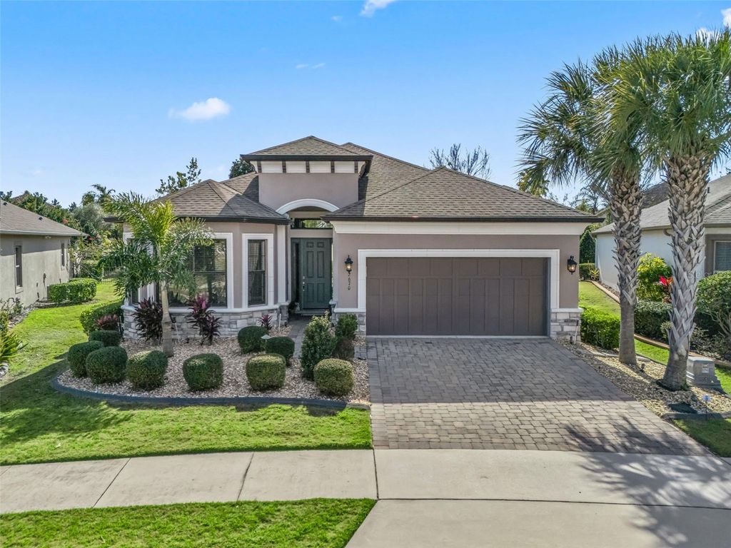 Photo of 2670 Stargrass Circle, Clermont, FL 34715 (MLS # OM717706)