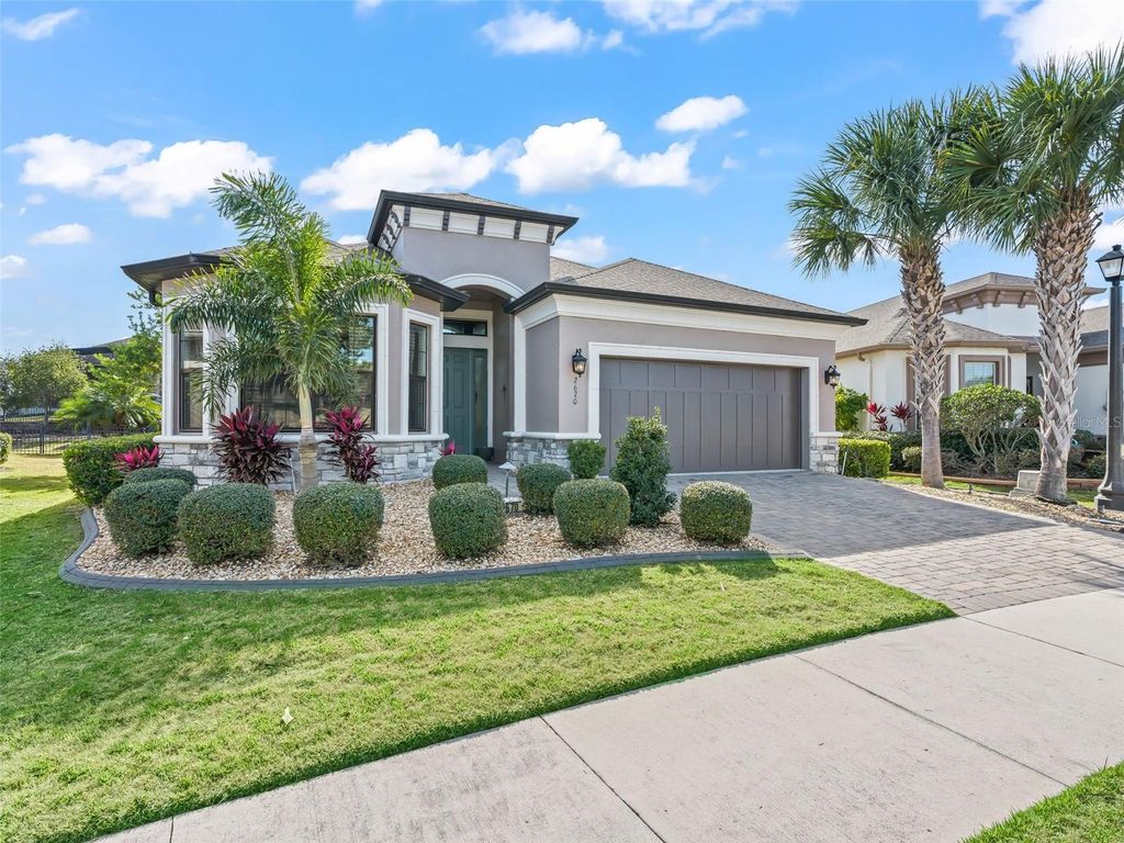 Photo of 2670 Stargrass Circle, Clermont, FL 34715 (MLS # OM717706)