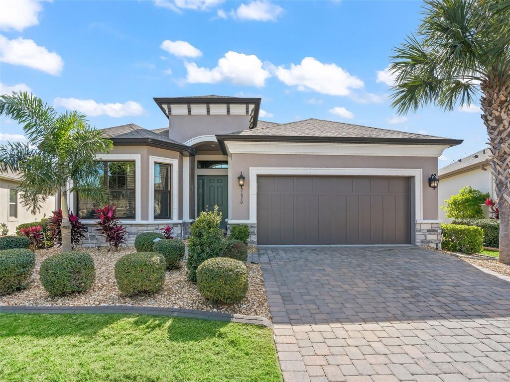 Photo of 2670 Stargrass Circle, Clermont, FL 34715 (MLS # OM717706)