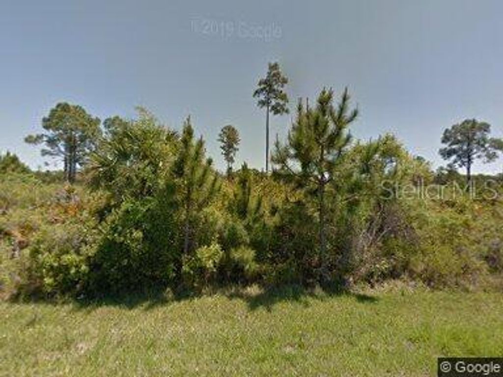 Photo of 482 Hanscom Street, Port Charlotte, FL 33953 (MLS # C7463631)