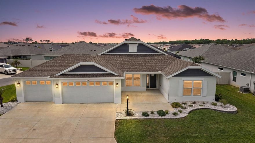 STUNNING, METICULOUSLY-MAINTAINED, Precast Concrete with STUCCO finish 3/2, 2080 sq ft Veranda (Saginaw) with SPACIOUS FULL 3-car GARAGE. EXPANSIVE ENCLOSED LANAI. perfectly situated on a LARGE CORNER LOT with REAR PRIVACY FENCING in the highly sought after CONTEMPORARY Village of Newell - JUST MINUTES to BOTH Sawgrass Grove and the NEW Eastport Town Square with live nightly entertainment! Built in 2023, this nearly new home offers low-maintenance peace of mind with modern design! Welcoming you are ENHANCED, TIERED hardscaping with STONED beds and a SPACIOUS 20’x15' front patio - ideal for RELAXING or ENJOYING fun filled OUTDOOR ENTERTAINING with friends! Step through a side lit screened entry door into the BRIGHT, GENEROUS foyer boasting HIGH ceilings and gorgeous LUXURY VINYL PLANK flooring that flows seamlessly THROUGHOUT the entire home - No carpet! The EXPANSIVE kitchen is truly a chef’s delight showcasing LIGHT GRAY SHAKER cabinetry with ROLL-OUT SHELVING, QUARTZ countertops, STAINLESS STEEL appliances with GAS cooking, built-in PANTRY, and an EAT-IN COUNTER-HEIGHT breakfast bar. The adjoining dinette is ideal for everyday dining and features DOUBLE windows that fill the space with abundant NATURAL LIGHT. HIGH VAULTED ceilings and an OPEN CONCEPT floor plan create a SPACIOUS, VOLUMINOUS main living area with interior blinds throughout. From the living and dining rooms, step through four-panel sliding glass doors into the EXPANSIVE, ENCLOSED INSULATED 30’ x 11’ lanai. This wonderful OUTDOOR OASIS boasts a DECORATIVELY PAINTED floor, surrounding FULL PANEL sliding doors, lanai shades, and an adjacent rear patio - perfect for grilling and enjoying the amazing Florida weather - all within a PRIVATE, enclosed yard. Back inside, retreat to your luxurious primary suite boasting a TRAY ceiling, and TWO SPACIOUS CUSTOMIZED WALK-IN closets. Its ensuite bathroom features TWO LIGHT GRAY SHAKER vanities with QUARTZ tops, TILE ROMAN-STYLE WALK-IN shower, built-in LINEN closet, and a separate water closet. A SPLIT FLOOR PLAN, places two additional bedrooms and second bathroom near the front of the house, creating a PRIVATE guest wing and/or quiet home office. Bedroom two offers a VAULTED ceiling and CUSTOMIZED built-in closet. The second bathroom features a LIGHT GRAY SHAKER vanity with QUARTZ top, TILED tub and shower combination, and a hallway LINEN closet. The third bedroom has a VAULTED ceiling, DOUBLE windows, and a built-in closet. A SPACIOUS, INTERIOR LAUNDRY ROOM showcases LIGHT GRAY SHAKER cabinetry with shelving and a built-in UTILITY SINK. It leads you into the OVERSIZED, EXTRA-DEEP 32’x25’ FULL THREE-CAR INSULATED GARAGE with a WHOLE-HOUSE Nova water filtration system. DON’T MISS YOUR OPPORTUNITY TO OWN THIS INCREDIBLE HOME! The Village of Newell is close to Sawgrass Grove, Brownwood Paddock Square, and the NEW Eastport Square; 26 miles of walking and biking trails; six neighborhood pools and recreation centers (Franklin, St. Catherine, Bradford, Aviary, Hawkins, Homestead); three large regional recreation complexes (Ezell, Everglades, and Rohan); Southern Oaks Country Club and Championship Golf Course; Clifton Cove Putting Course; Mickylee Pitch and Putt; shopping and dining at Magnolia Plaza; Homestead dog park for your furry friends and more! PLEASE WATCH OUR WALKTHROUGH VIDEO of this MAGNIFICENT HOME and call today to schedule your Private Showing or Virtual Tour!