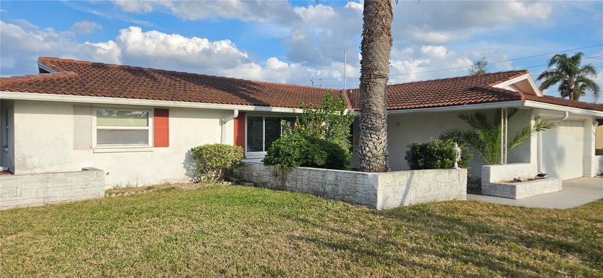 Desirable Flor-A-Mar waterfront opportunity in Gulf Harbors! This block home offers 2 bedrooms, 2 baths, 2-car garage, 80' of seawall waterfront, and sits on a deep, wide canal with quick Gulf access just minutes to open water. Located on one of the area’s most desirable canals, enjoy beautiful water views, boating, fishing, and watching dolphins and manatees right from your backyard.
Home flooded during Hurricane Helene and drywall has been cut, creating a head start for renovation. Plumbing is functional and the property is ready for your updates and personal touches. Interior features include a split floor plan, spacious primary suite, family room with wood-burning fireplace, formal living/dining areas, large kitchen with breakfast bar, ceramic tile flooring, and multiple lanais/screened outdoor living spaces.
Outside you’ll find a floating dock, the remnants of a boat lift/davits, seawall, mature landscaping, and room to create the ultimate waterfront retreat.
Priced 169k below tax assessed value, this is a rare chance to buy a gulf-access canal home in a highly sought-after waterfront neighborhood and build instant equity.
Enjoy the freedom of an optional HOA at just $125 annually, with the additional opportunity to join the exclusive Gulf Harbors private beach club for only $200 per year, featuring white sand, cabanas, grills, and unforgettable Gulf sunsets. The neighborhood is golf cart friendly and centrally located with easy access to downtown New Port Richey, home to the Riverwalk at Sims Park, local shops, restaurants, and bars.
Conveniently located near shopping, dining, medical facilities, and the Pasco/Pinellas line for easy Tampa Bay access.
Sold As-Is. Cash or renovation financing may be best.