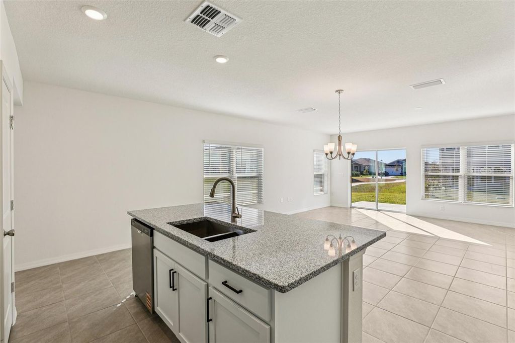 Photo of 387 Sequoia Drive, Lake Wales, FL 33859 (MLS # O6407826)
