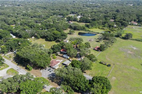 Photo of 6003 16th Avenue S, Tampa, FL 33619 (MLS # TB8440571)