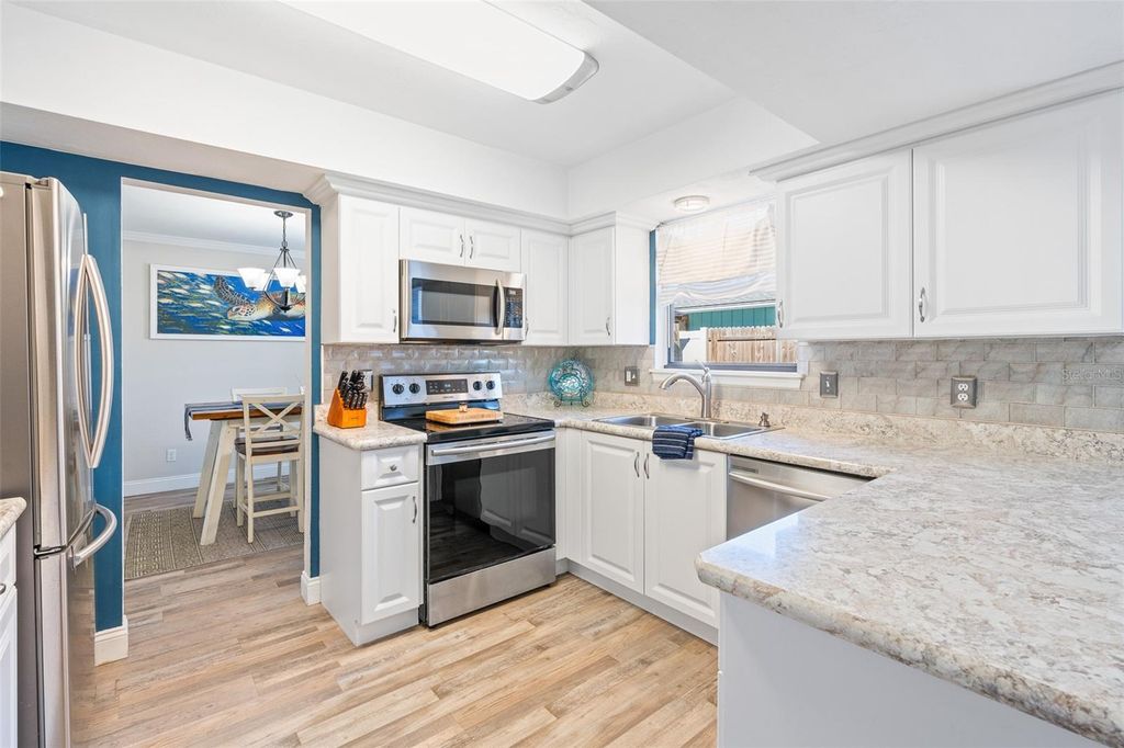 Photo of 1197 Southfork Court, Port Orange, FL 32129 (MLS # V4946751)