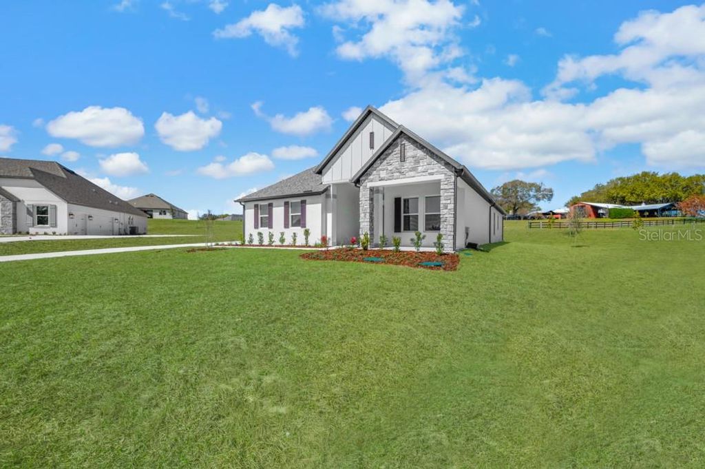 Photo of 3836 Saddle Hill Trail, Fruitland Park, FL 34731 (MLS # TB8486563)