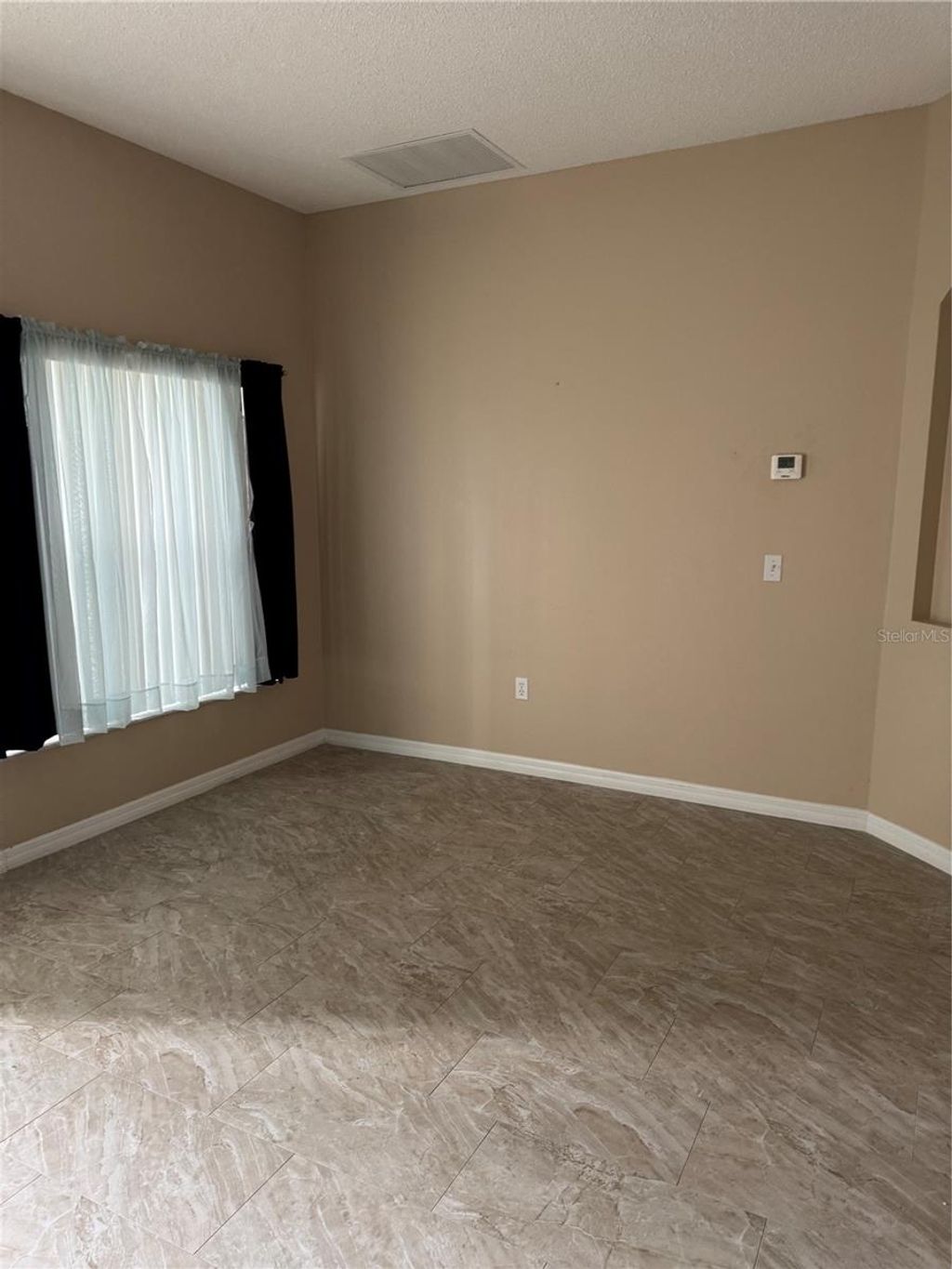 Photo of 324 Aldershot Court, Kissimmee, FL 34758 (MLS # S5136738)