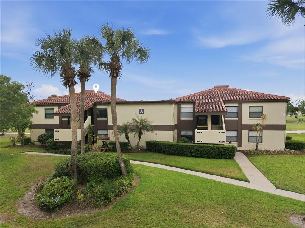 Photo of 6111 Lake Pointe Drive #202, Orlando, FL 32822 (MLS # O6403581)